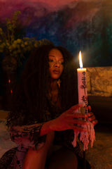 Heka ceremonial candles lit in ritual setting.